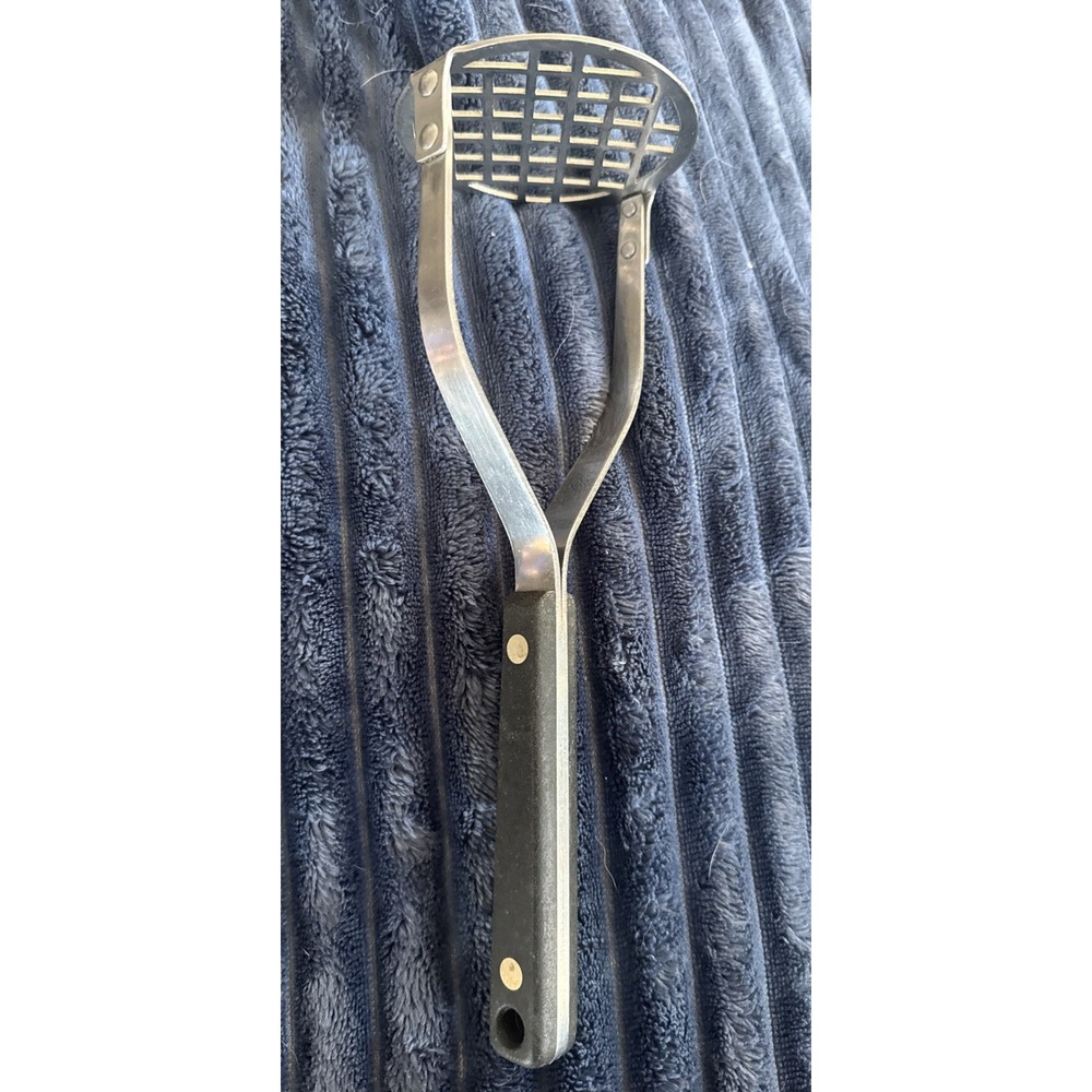 Vintage Flint Arrowhead Stainless Steel Potato Masher Black Full Tang Handle USA